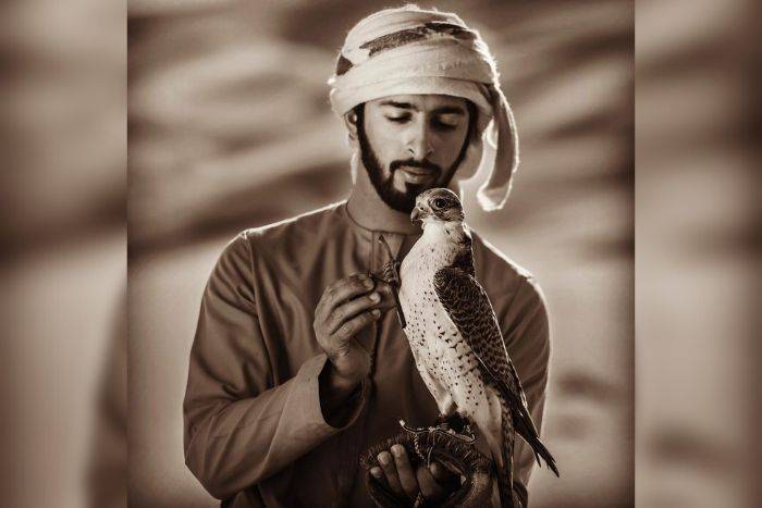 Man holding falcon by aboreem1971 from Instagram Man holding falcon by aboreem1971 from Instagram