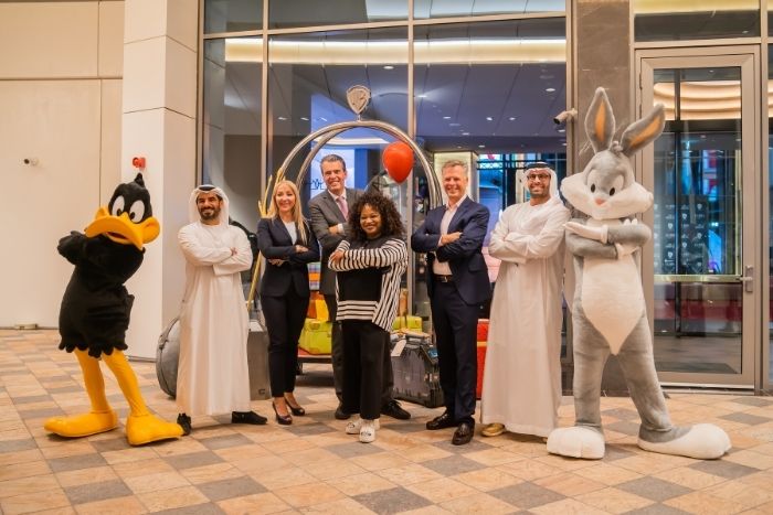 Mohamed Abdalla Al Zaabi (Ceo Of Miral), He Mohamed Khalifa Al Mubarak (Chairman Of Miral), Jochem-Jan Sleiffer (President, Hilton, Mea &Amp; Turkey) And Pam Lifford (President, Warnermedia Global Brands And Experiences) At The Grand Opening Of The Wb™ Abu Dhabi