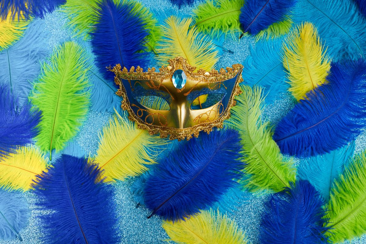 A Mardi Gras Mask Under Feather Boas For The Butterfly Carnival In Dubai This 2024