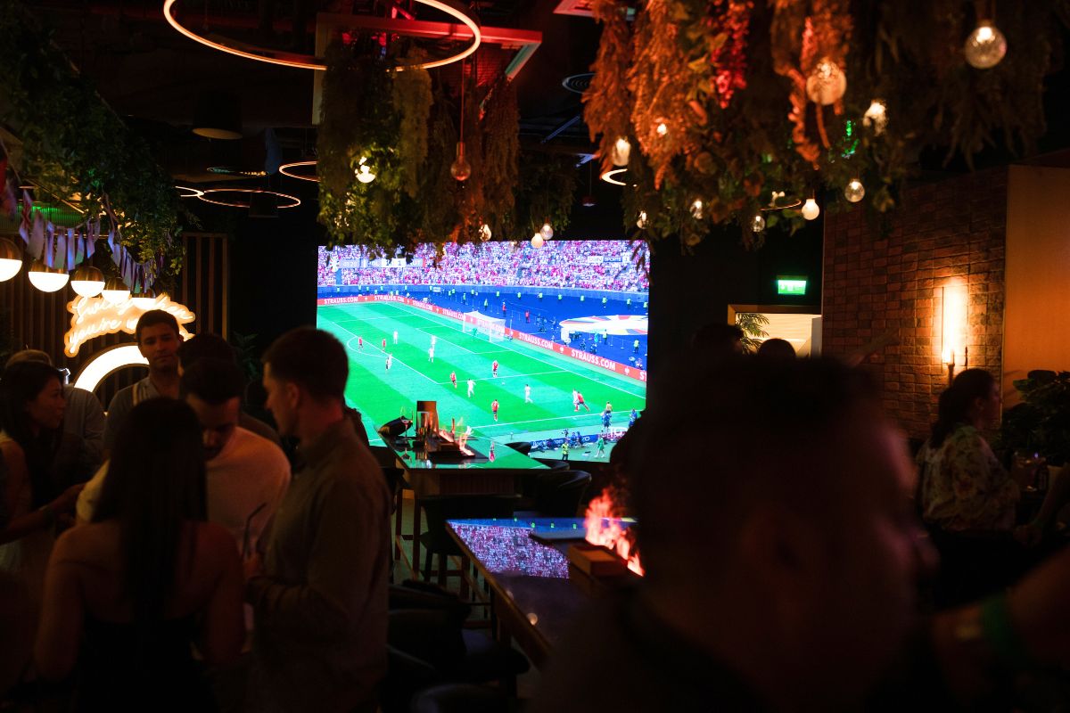 Oche Bar For Euro 2024 Featuring A Big Screen Showing The Game