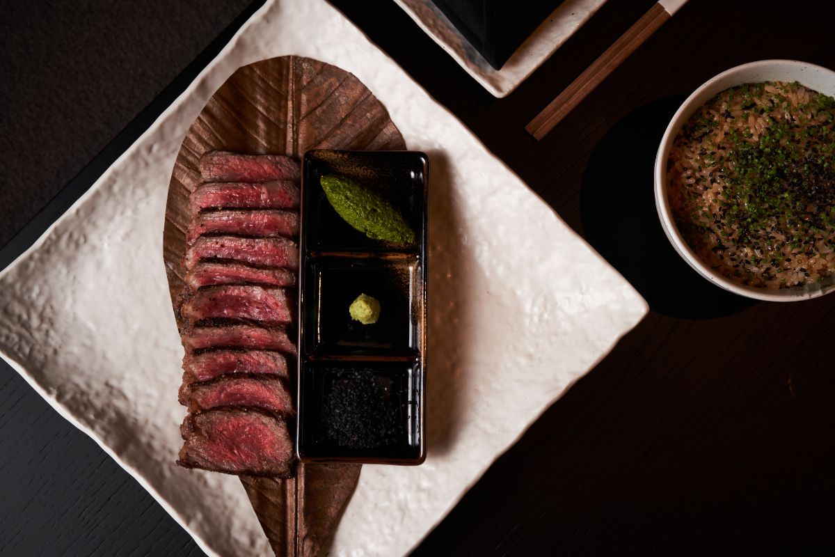 A Plate Of Wagyu Beef With Wasabi At Okku Dubai