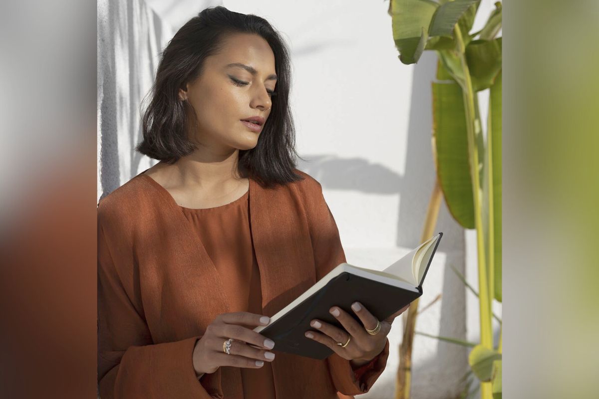 Namal Siddiqui reading a book