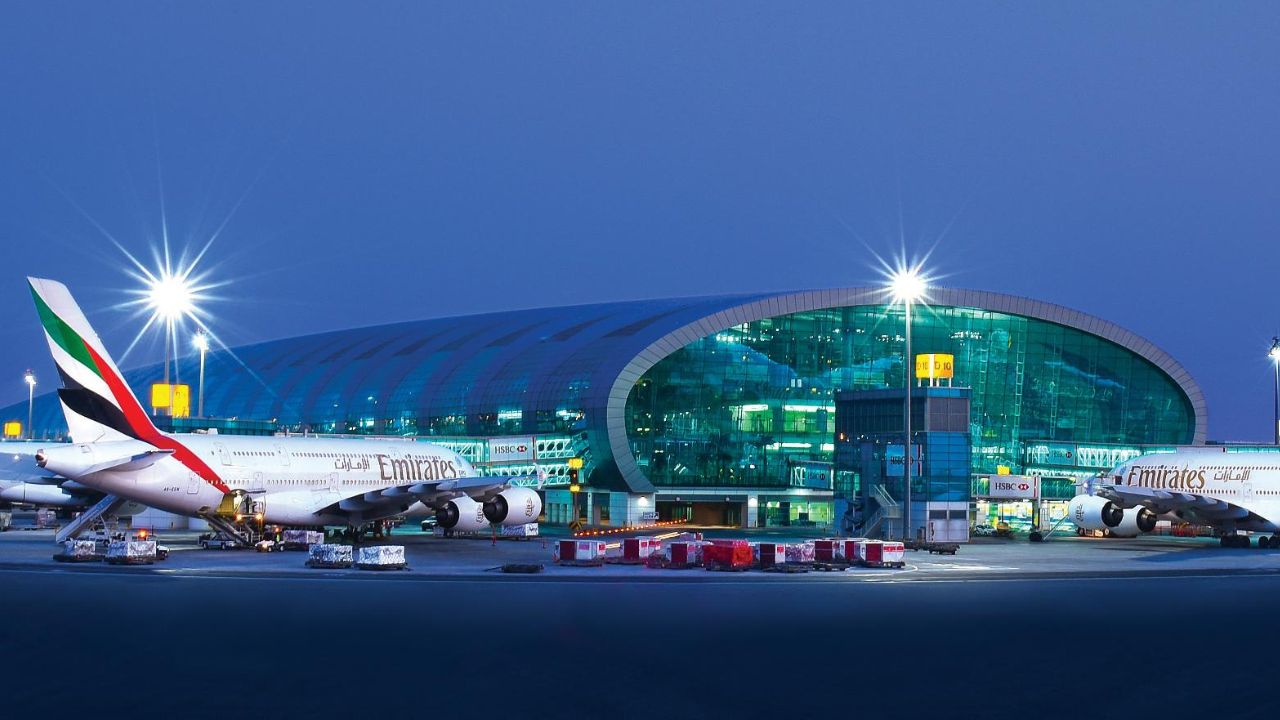 Dubai airport exterior with emirates planes
