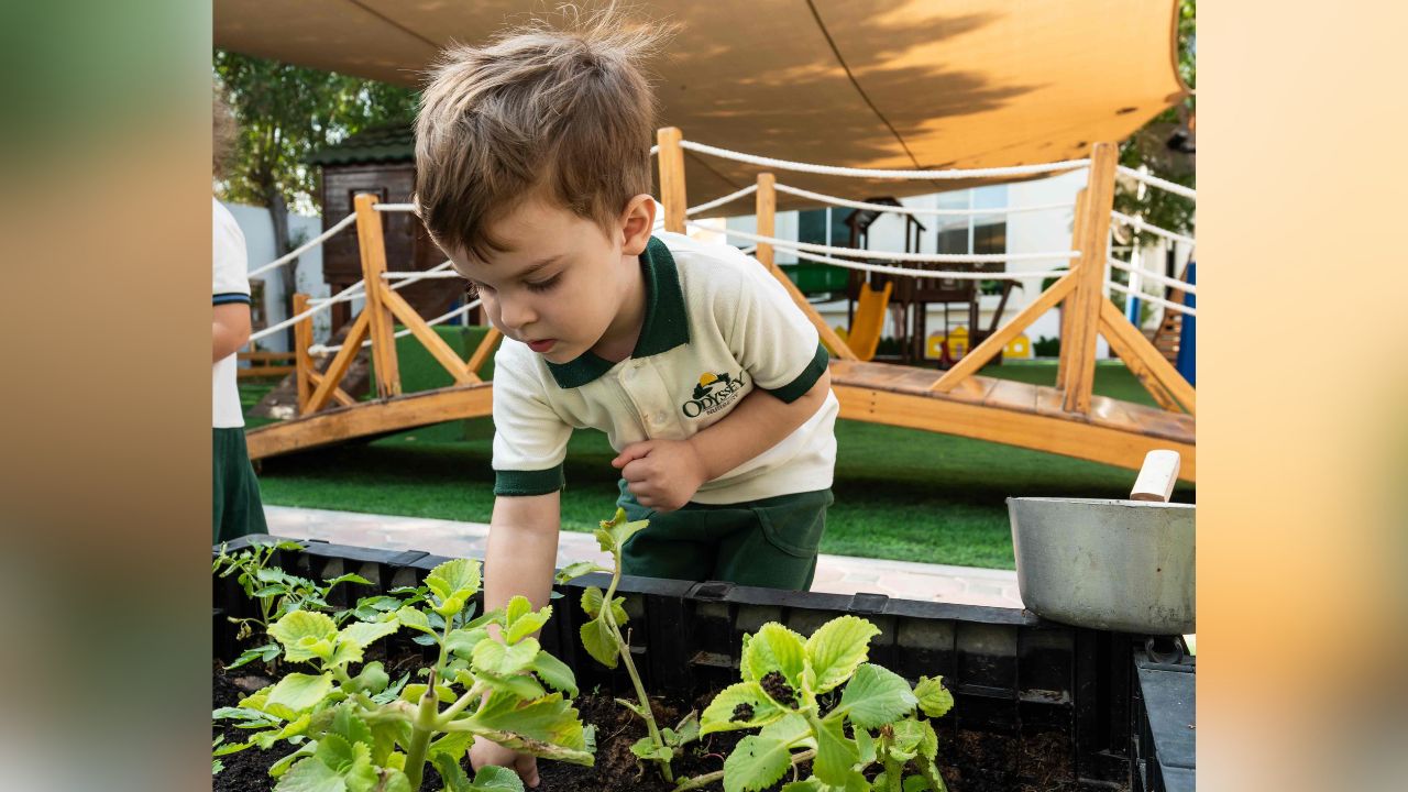 Odyssey Nursery student planting