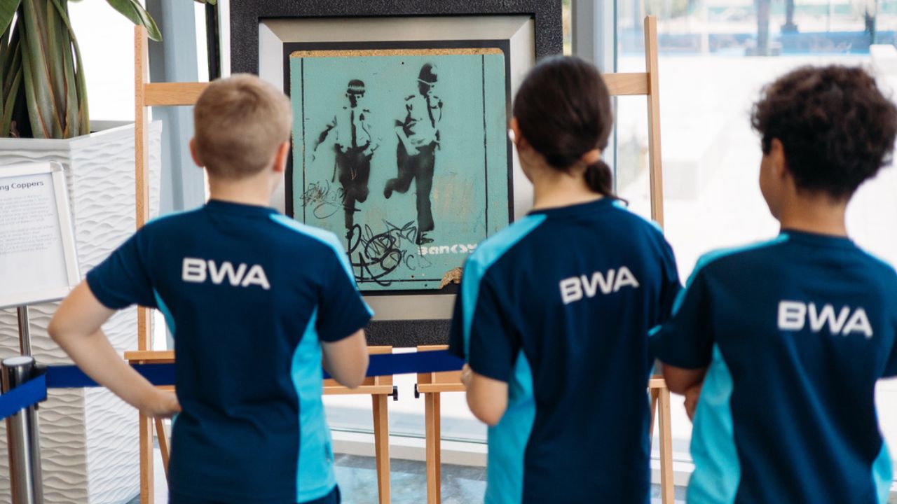 Art with attitude: Banksy headlines Bloom World Academy’s showcase Bloom world academy art fair banksy