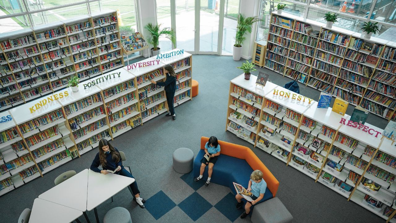 Horizon international school student in library reading