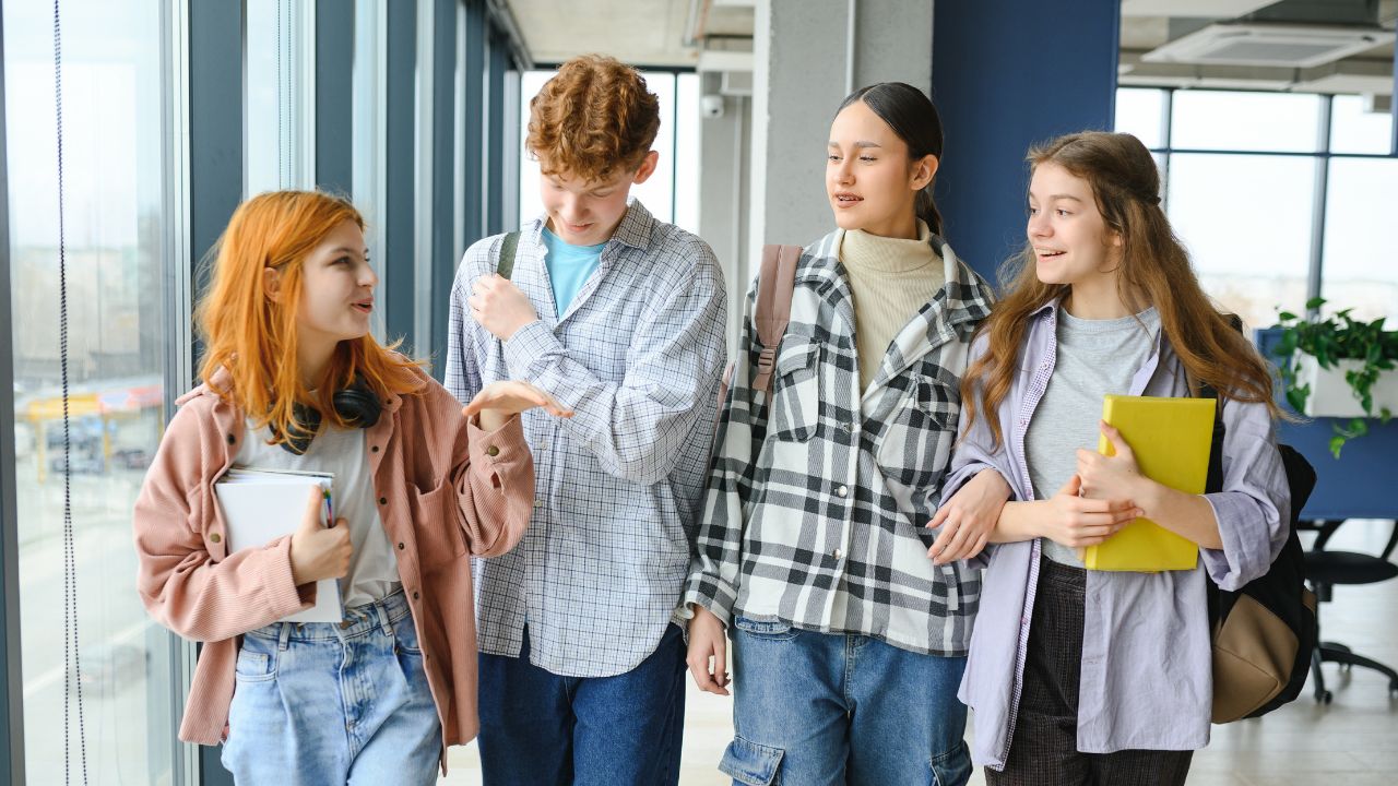 College students talking and walking