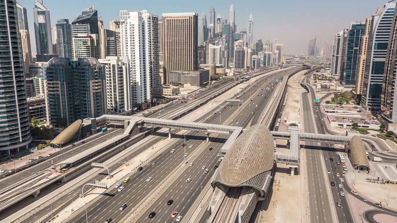 Dubai police AI radars monitoring busy highway traffic.