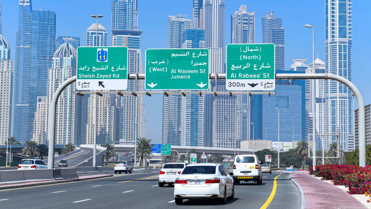 Cars driving through dubai morning time