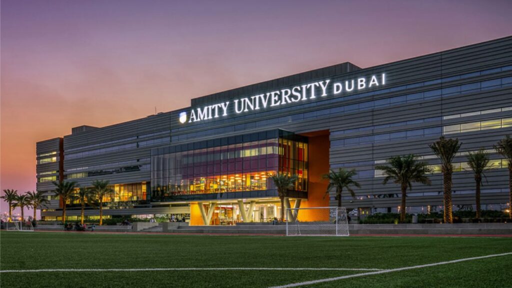 Amity University Dubai campus exterior view at sunset.