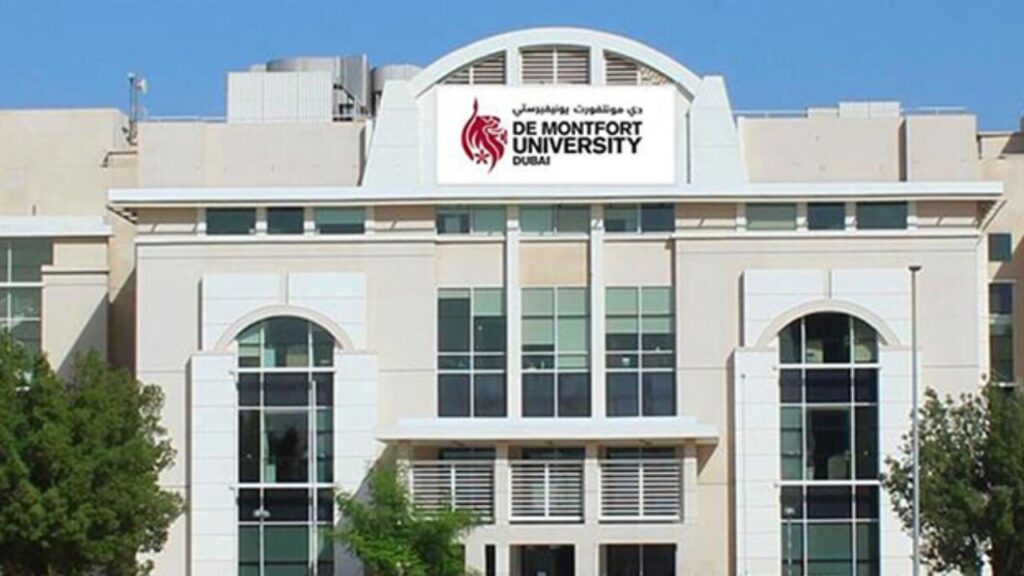 De Montfort University Dubai campus building with modern architecture and university logo.