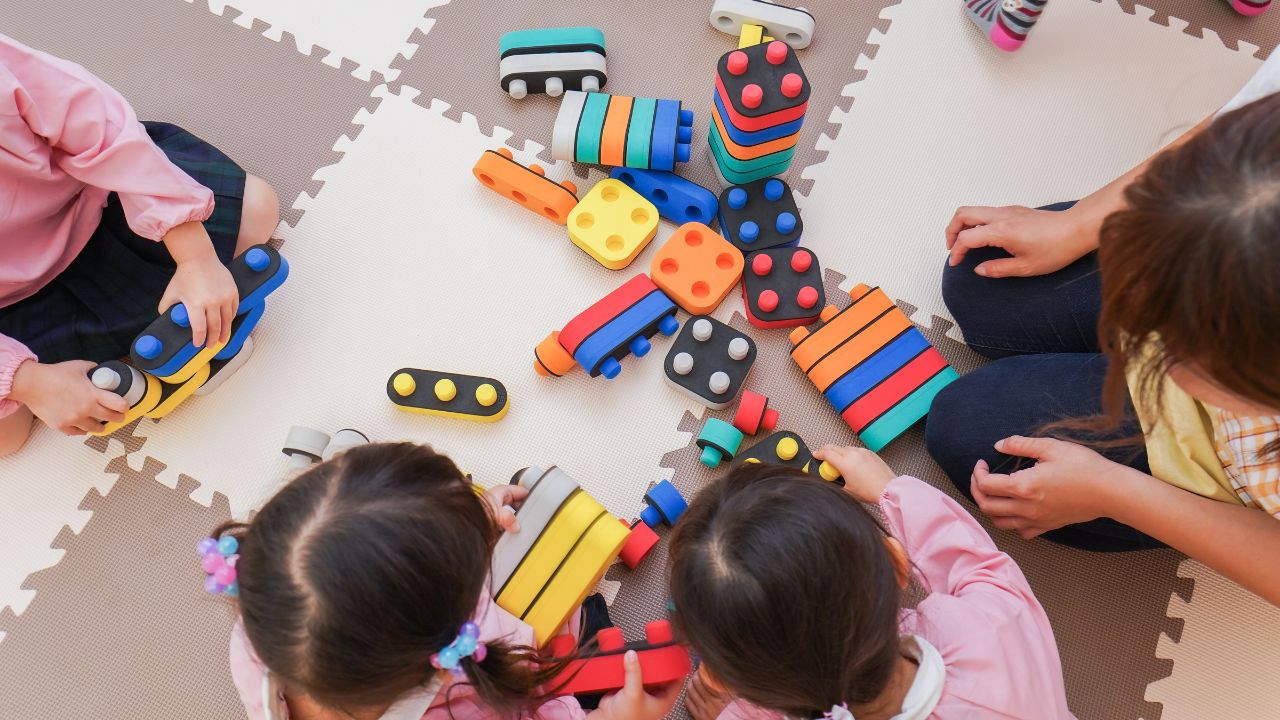 nursery kids playing with blocks
