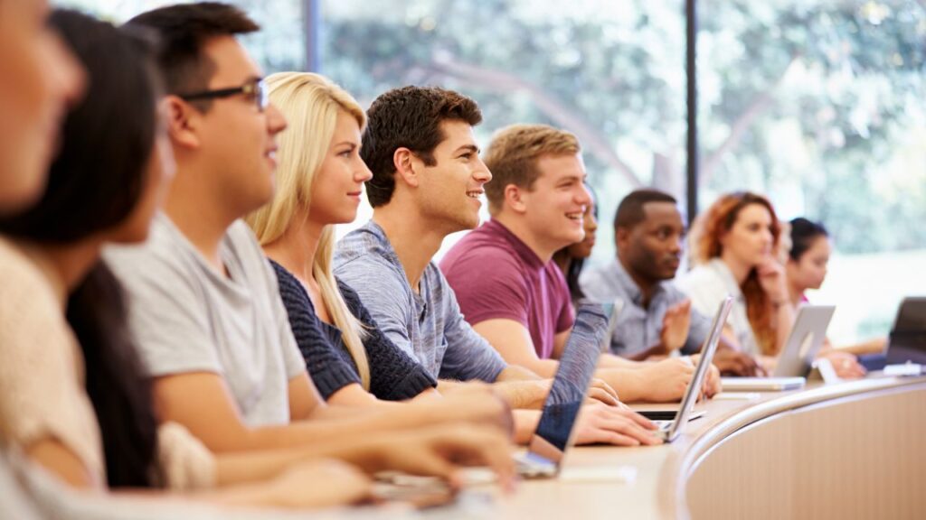 group of students listening to a lecture