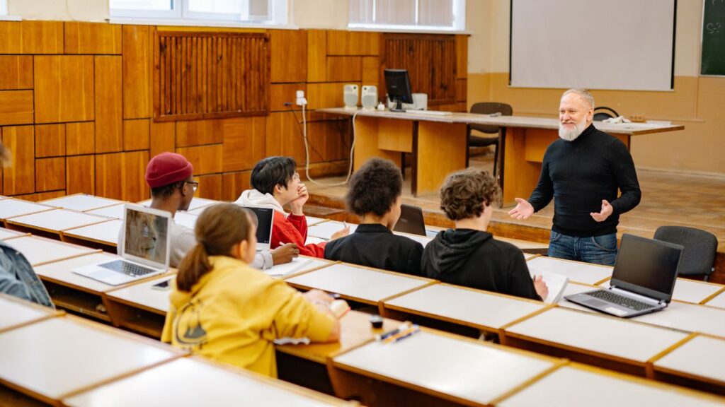 group of students listening to there professor
