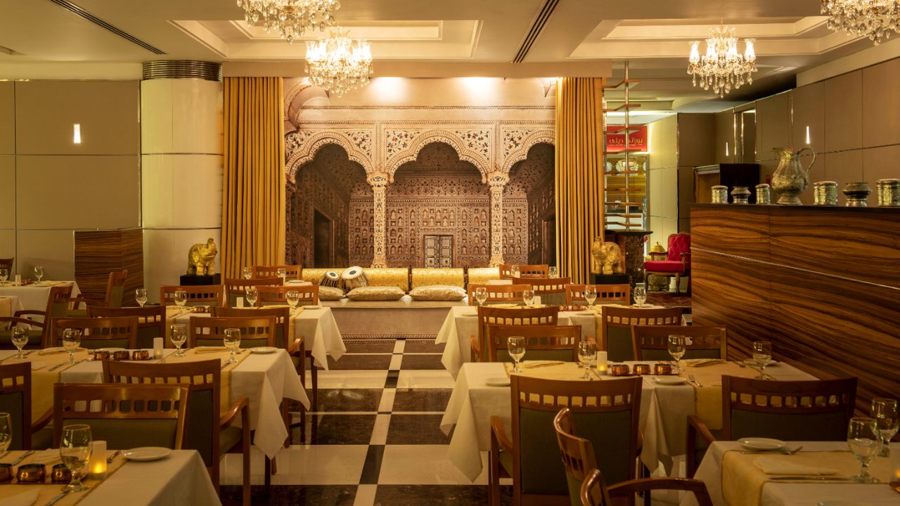 Luxurious restaurant with traditional Middle Eastern decor and ambient lighting.