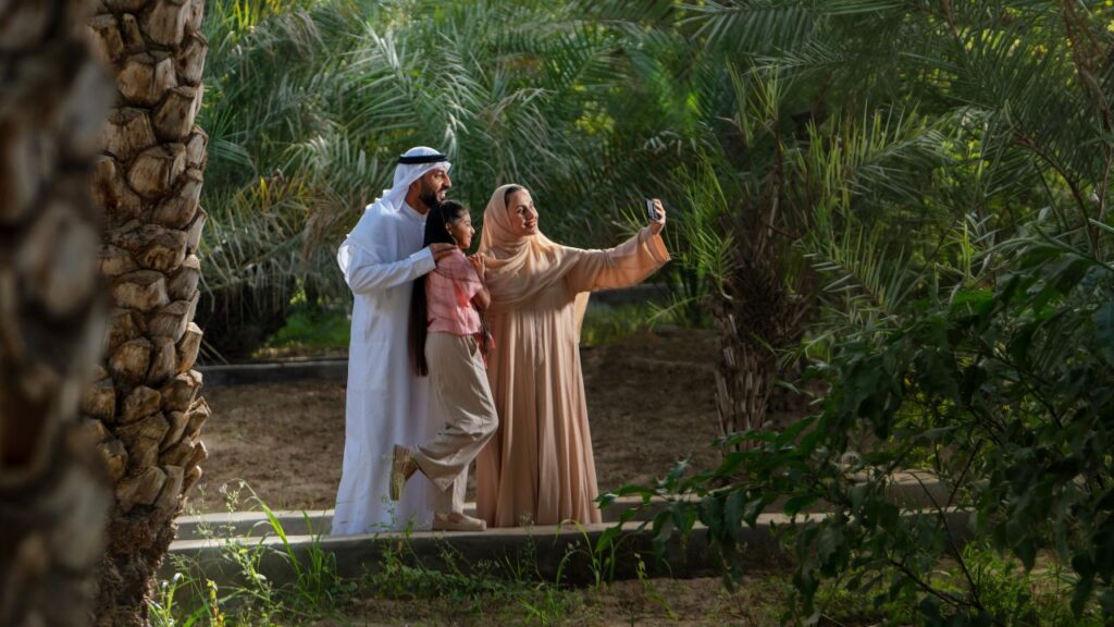 family taking a selfie with trees