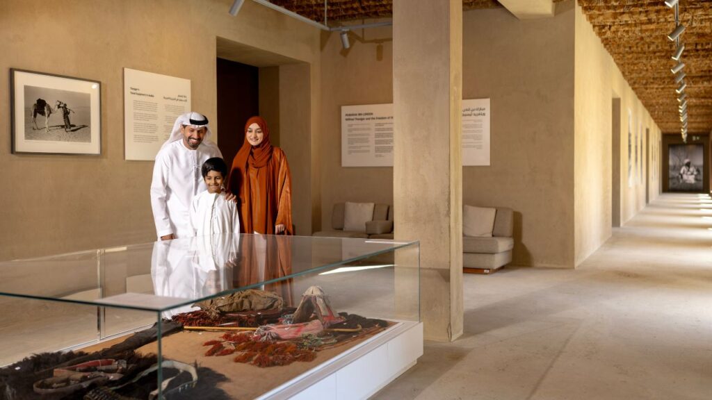 family looking at artifacts