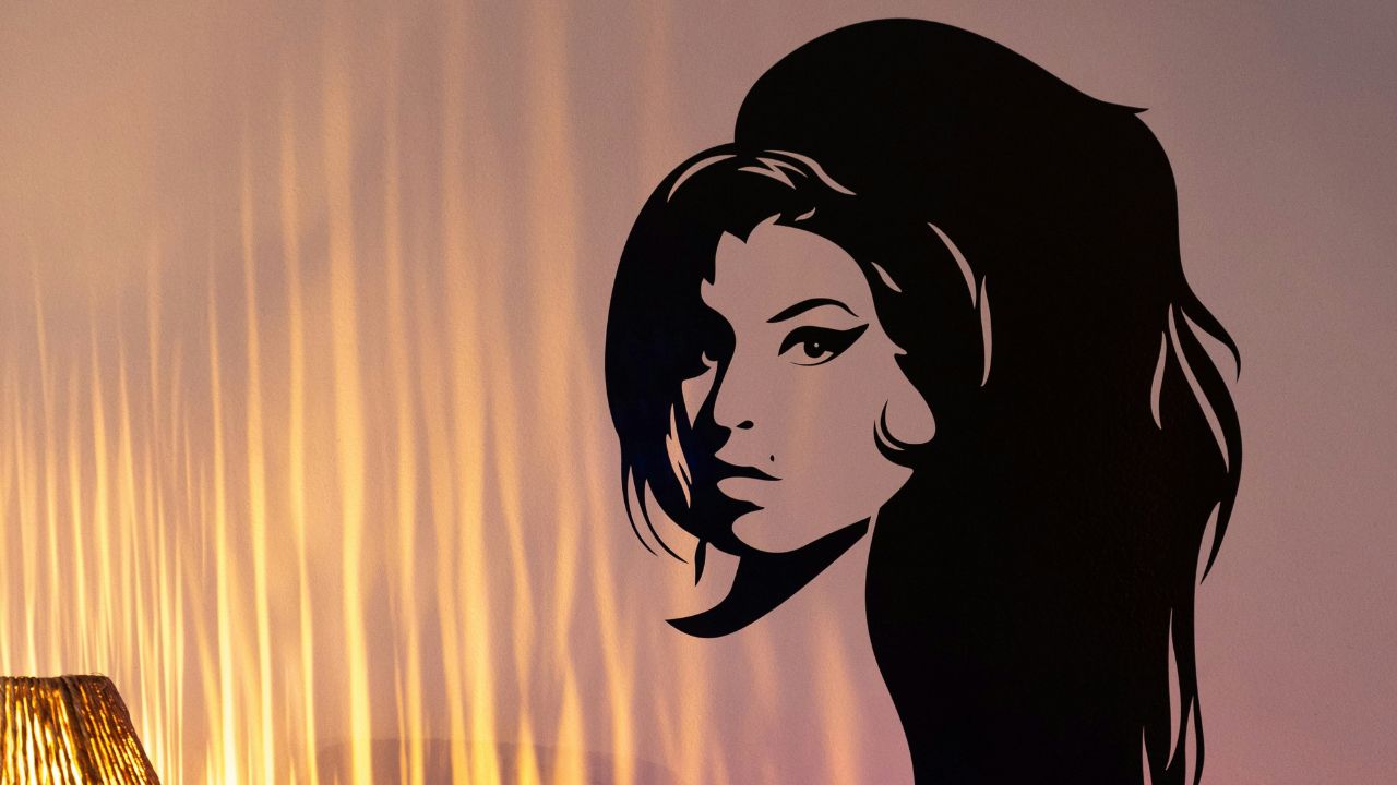 Amy Winehouse silhouette sticker on a wall