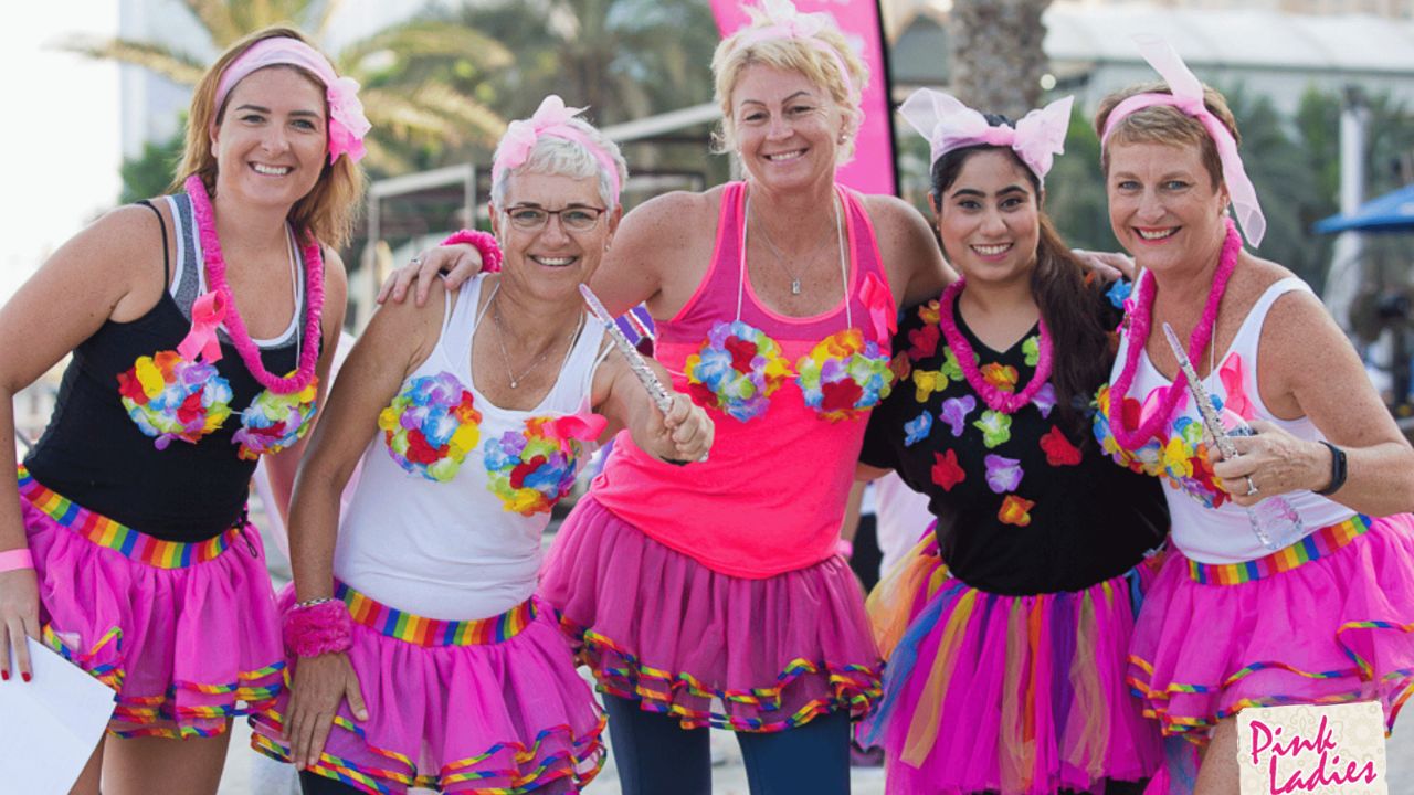 ladies smiling wearing pink
