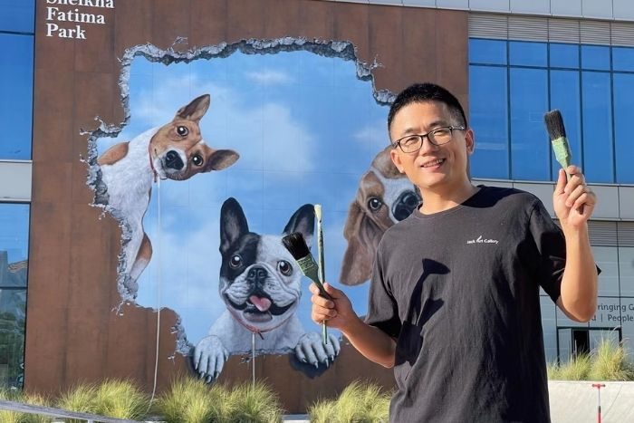 Jack Lee Discusses Life As An Artist And Sheikha Fatima Park’s Dog Mural.