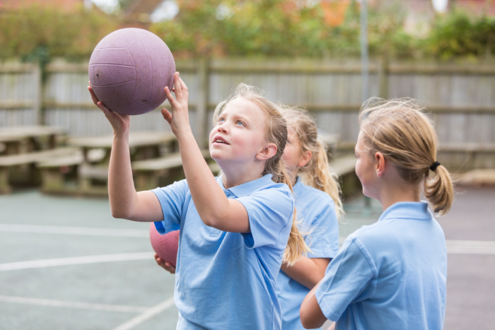 Girls are playing netball in abu dhabi uae